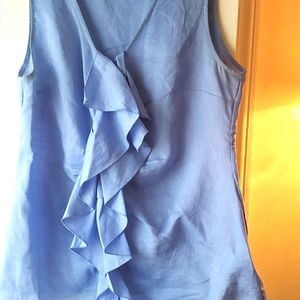 Blue linen blouse with ruffles